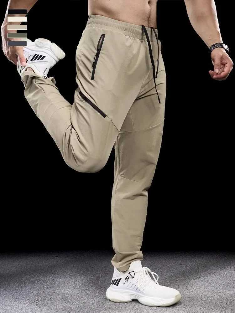 New Autumn Winter Men Quick-drying Sports Casual Trousers Gym Fitness Running Training Clothes Micro-elastic Zipper Pocket Pants W250318