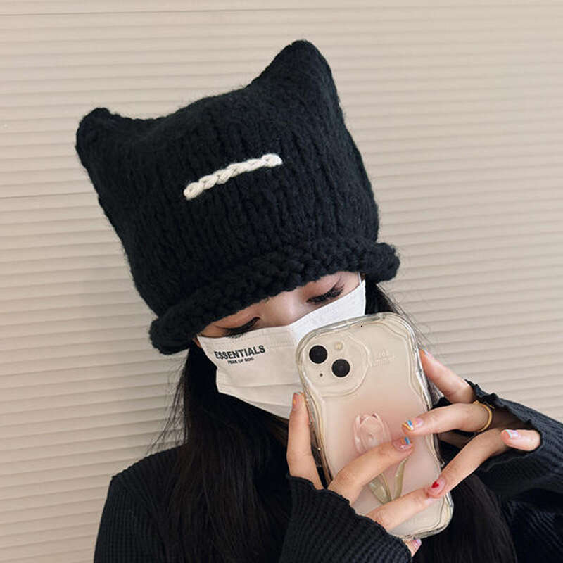 Korean version of new cute cat ear knitted wool for children's autumn and winter fashion, thickened warm hood, cold hat