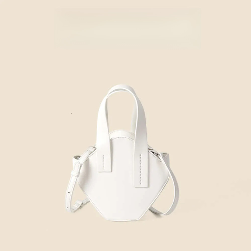Fashion Designer Mini Handbag Niche Slanted Irregular Diameter Bag Trend Versatile High end Lightweight Handbag 2025 Summer New Item