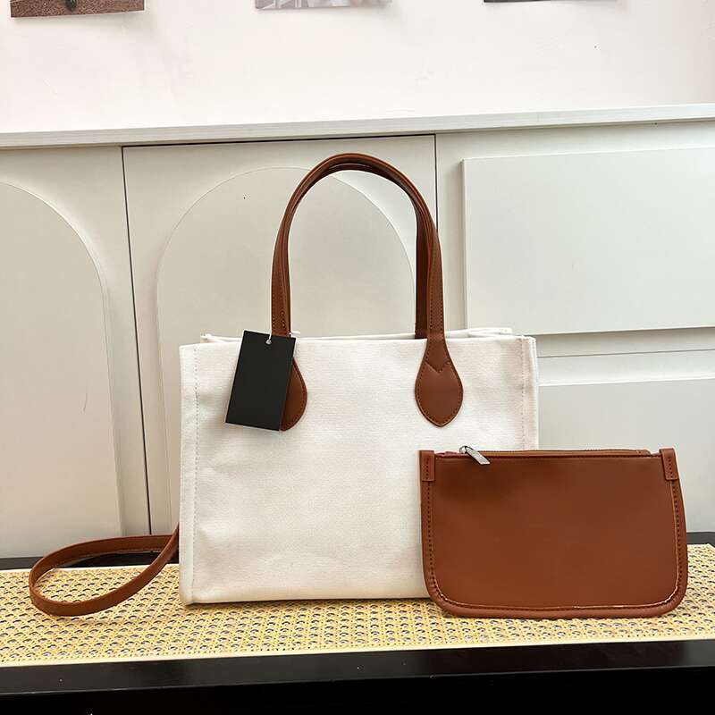 Wholesale new high-quality shoulder bags, large capacity commuting tote bags, versatile hand-held women's bags