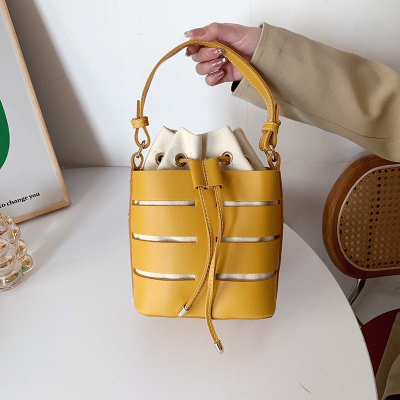 2025 New Fashion Designer Women s Handbag Multi Color Hollow Bucket Bag High Quality Popular Crossbody Bag Trendy Large Capacity Single Shoulder Walle