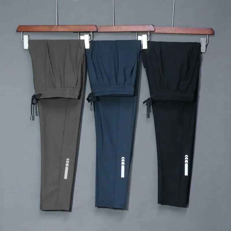 Summer elastic mens running sports pants jogging sports pants casual outdoor training gym sports pants W250318