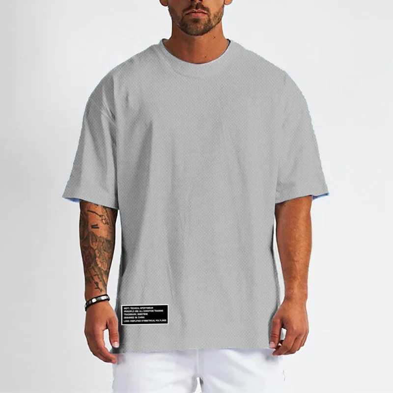 Gym Clothing Mens Fitness Oversized Loose T-Shirts Outdoor Hip Hop Streetwear Mesh Quick Dry Short Sleeved Bodybuilding ShirtsT250318