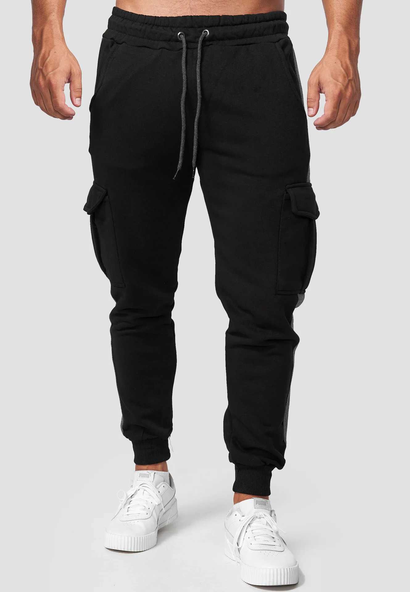 New winter sportswear mens plush sports pants Lambswool hot pants casual pants windproof and warm cotton pants W250318