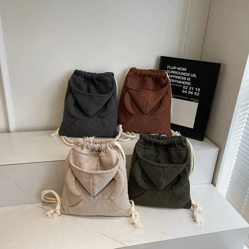 2025 Fashion Xzbag Korean Niche Angel Wing Backpack Simple And Versatile Drawstring Backpack Sweatshirt Hat Bag Y2k Girl Bag 250318