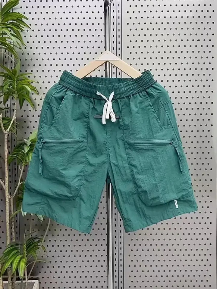 Product shorts mens summer thin loose multi pocket fifth pair of pants quick drying shorts mens summer mens Bermuda shorts Korean fashi 250317