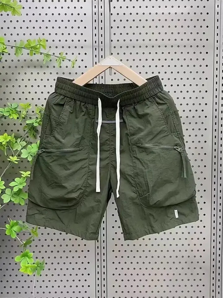 Product shorts mens summer thin loose multi pocket fifth pair of pants quick drying shorts mens summer mens Bermuda shorts Korean fashi 250317