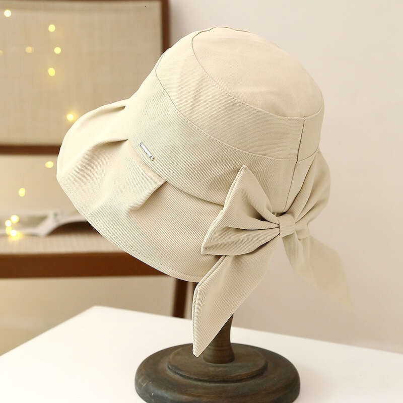 Spring and Autumn Sunscreen Women's Large brimmed UV resistant Fisherman's Hat, Korean Version Bow Casual Sun Hat
