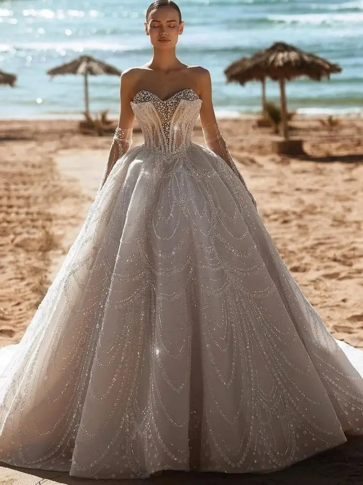 Gorgeous A e Women Wedding Sweetheart Neck Strapless Sleeveless Bridal Gowns Sequins Pearls Rhie Sweep Train Dress Custom Made