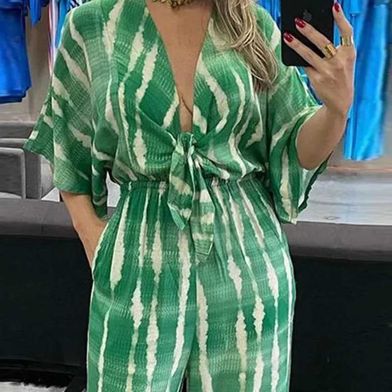 Elegant womens jumpsuit 2024 summer simple casual V-neck lace loose womens fashionable wide leg jumpsuit S-XXXL X250318