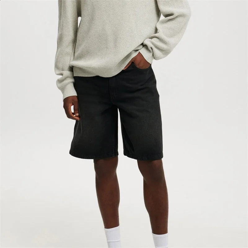 Mens retro washed denim shorts loose fit high waist creating a fashionable summer look 250319