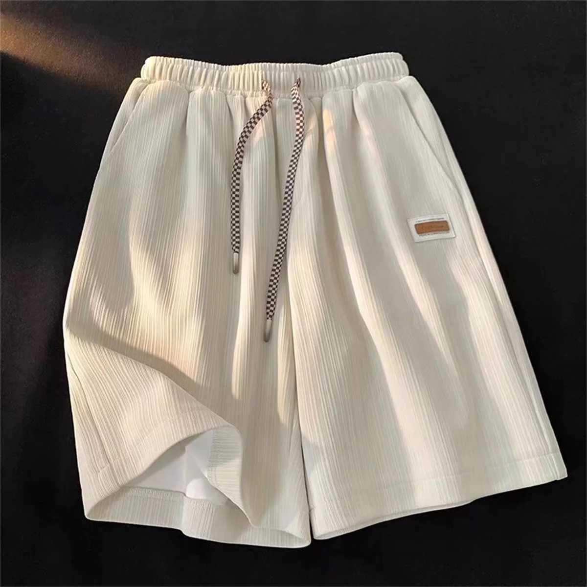 Casual solid shorts mens summer fashion and casual black pants student trend Hong Kong style gym pocket running pants mens outerwear W250319