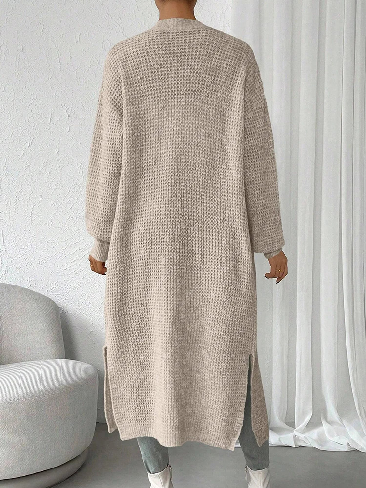 Fashionable and elegant solid color knitted sweater V-neck mid length hollowed out cardigan sweater womens top 250318