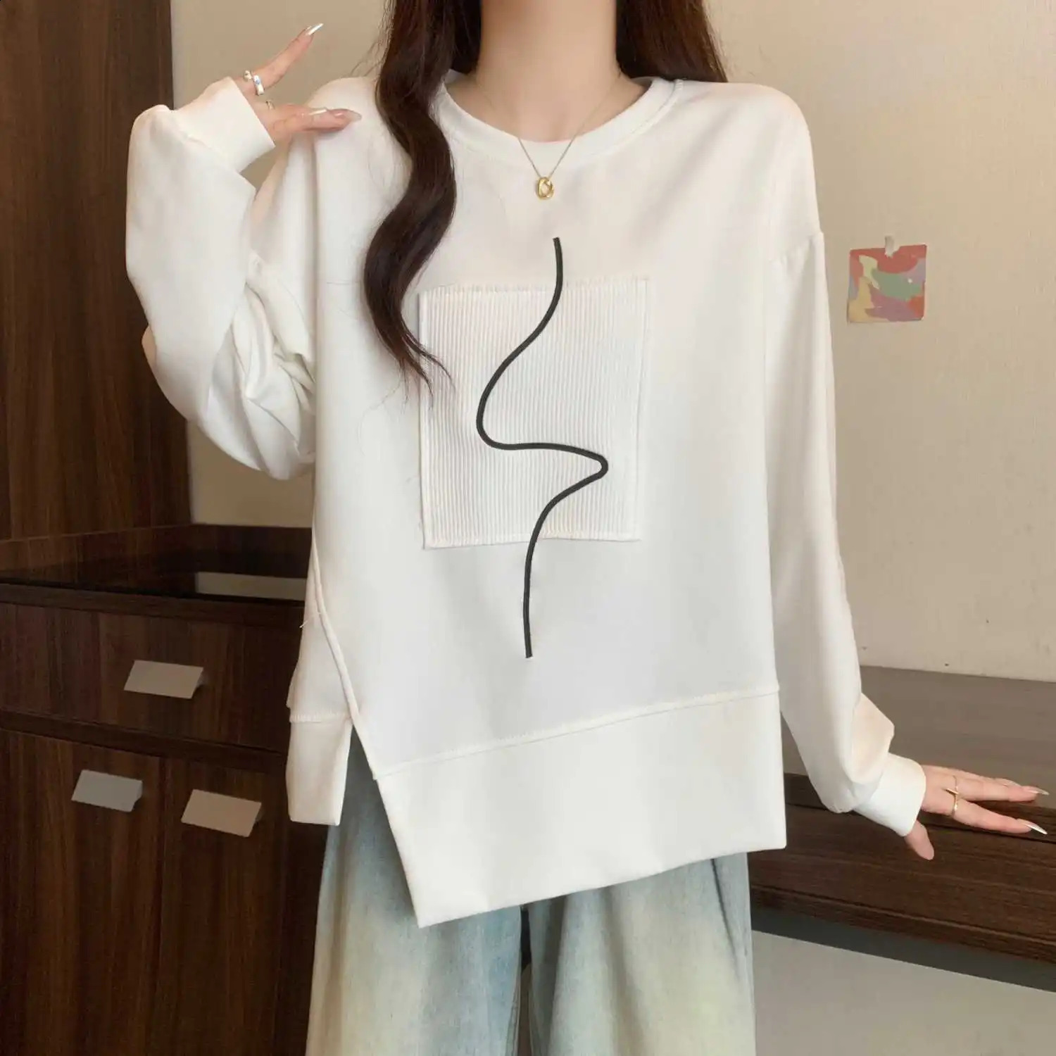 Womens round neck long sleeved casual loose sportswear autumn irregular top 250318