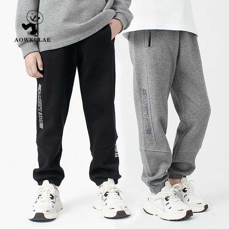 Youth boys clothing autumn childrens loose sports pants gray beige elastic waist Trouser cotton childrens long sports pants 4 8 12 yearsT250318