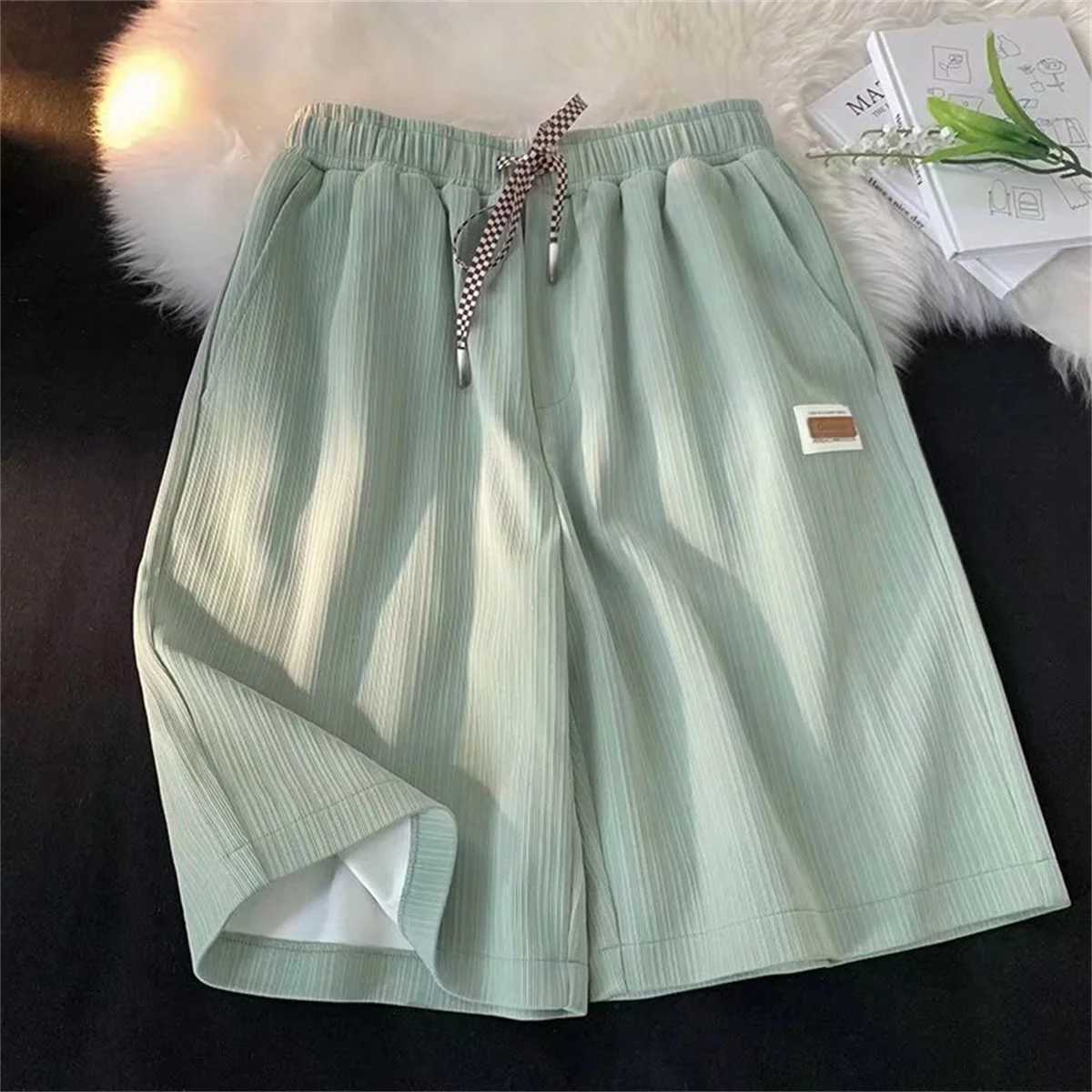 Casual solid shorts mens summer fashion and casual black pants student trend Hong Kong style gym pocket running pants mens outerwear W250319