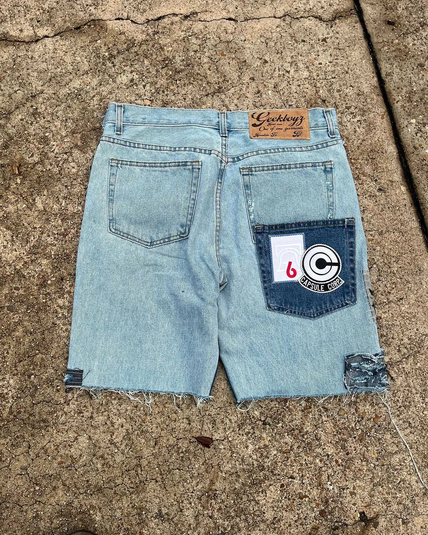 Mens hip-hop cartoon pattern decal embroidered denim shorts retro blue pocket gym shorts Y2K street basketball shorts W250319