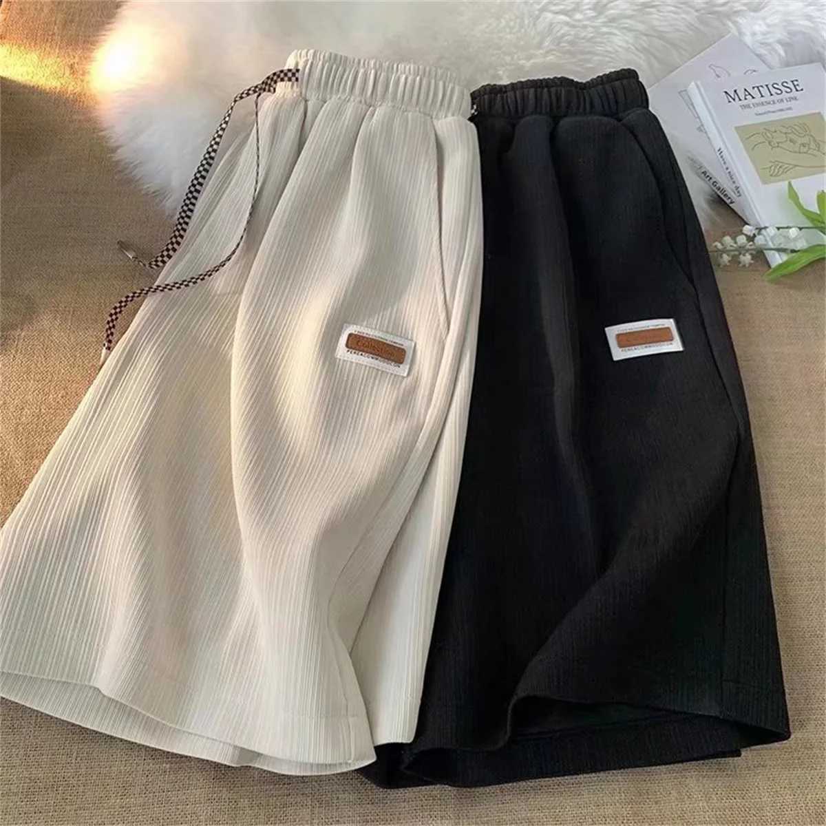 Casual solid shorts mens summer fashion and casual black pants student trend Hong Kong style gym pocket running pants mens outerwear W250319