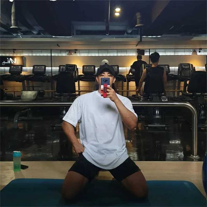 Regular gym clothing mens fitness oversized T-shirt outdoor hip-hop street clothing loose half sleeved fitness T-shirtT250318
