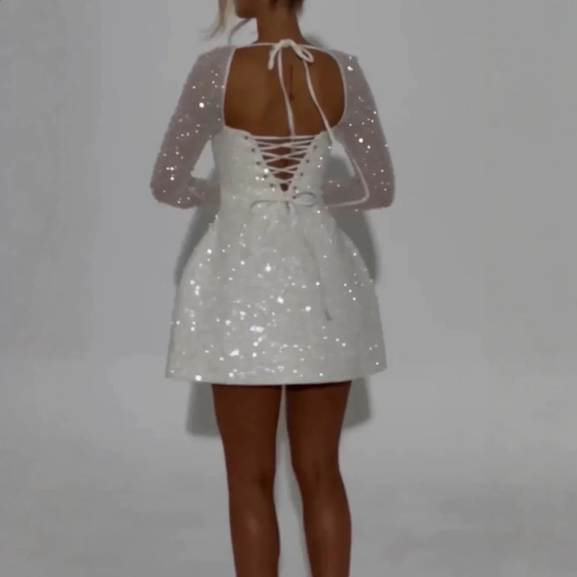 Sexy backless ALine mini skirt with bow long sleeved womens clothing ly arrived in winter 250319