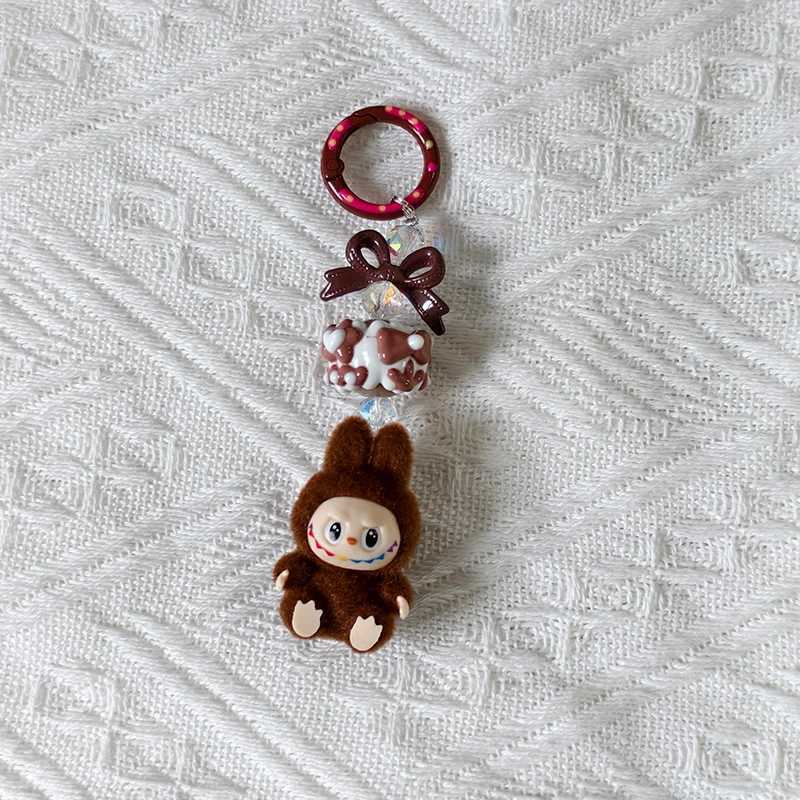New Mini Labubu Kawaii Particle Bow Keychain Creative 3D Doll Bag Phone Charm Keychain Male and Female Gifts X250318
