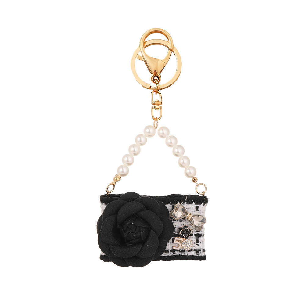 Keychains Lanyards New Camellia Handbag Model Keychain Creative Bow Pendant Car Key Hanging Chain Gift H250318