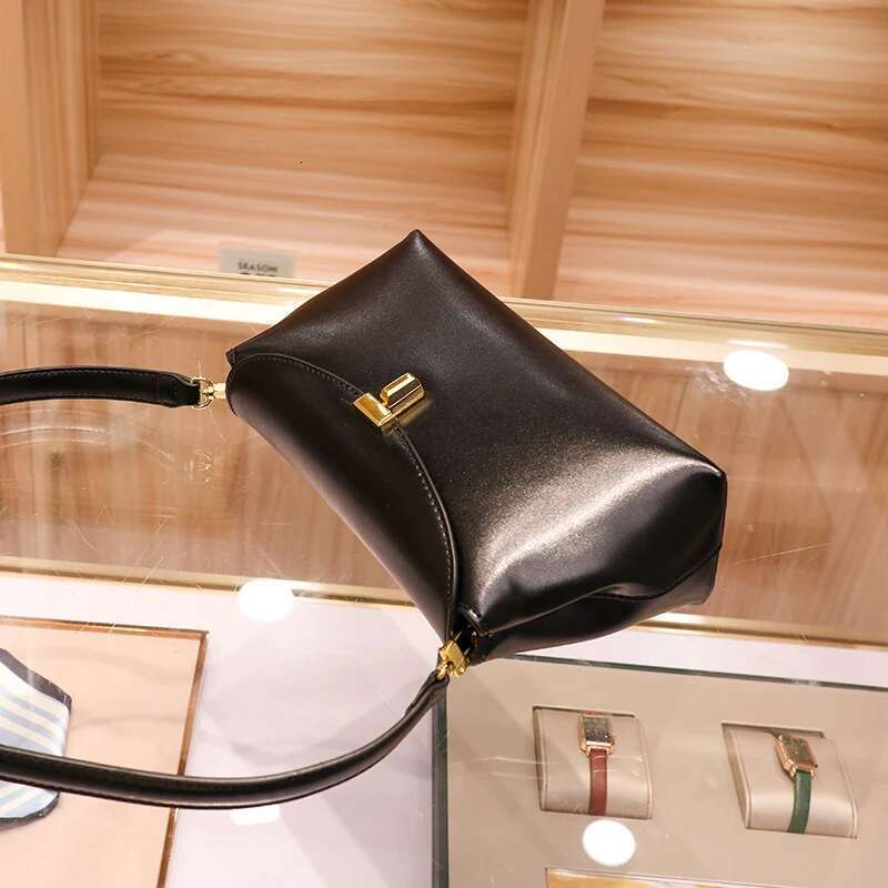 2025 new women's niche simple top layer cowhide T-shaped lock fashion commuter crossbody large capacity shoulder bag