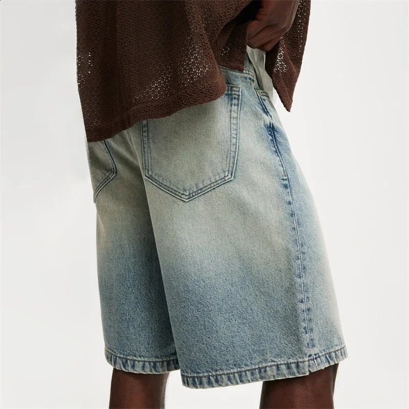 Mens retro washed denim shorts loose fit high waist creating a fashionable summer look 250319