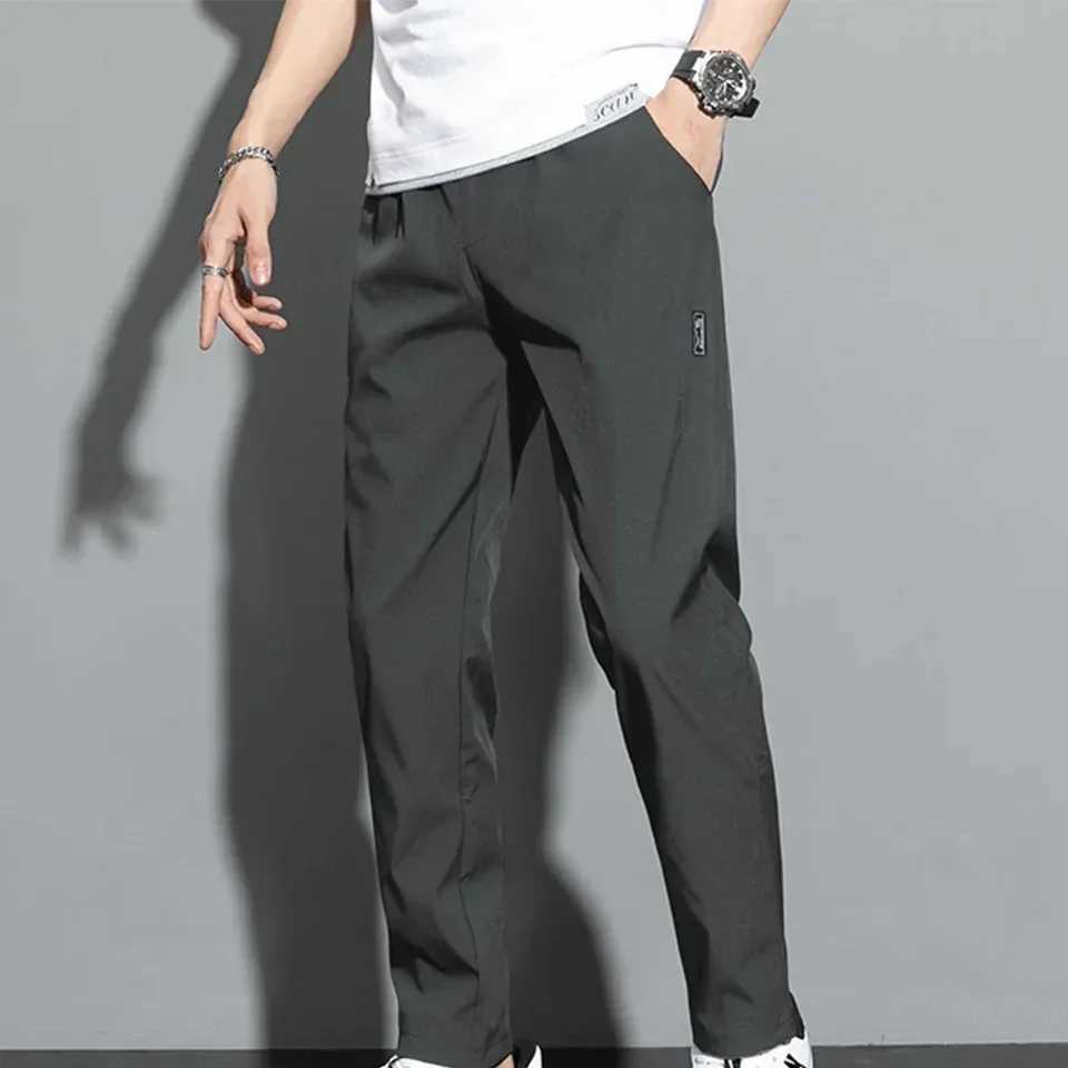 Autumn Pants Men Fitness Sportswear Tracksuit Elastic Waist Sweatpants Cotton Trousers Loose Gyms Jogger Track Pants Mens M- 5XL X250319