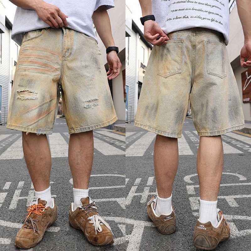 Yellow mud-dyed washed and worn-out holes straight denim cropped pants. Retro mens summer straight thin shorts are fashionable W250319