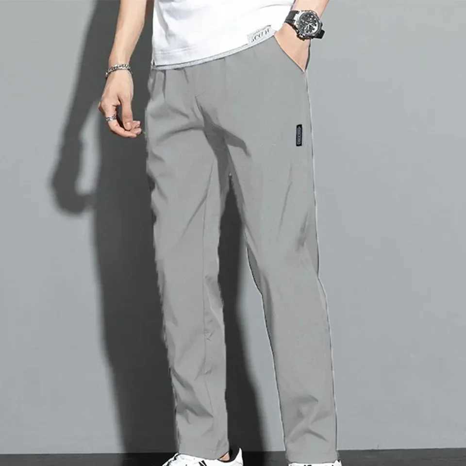 Autumn Pants Men Fitness Sportswear Tracksuit Elastic Waist Sweatpants Cotton Trousers Loose Gyms Jogger Track Pants Mens M- 5XL X250319