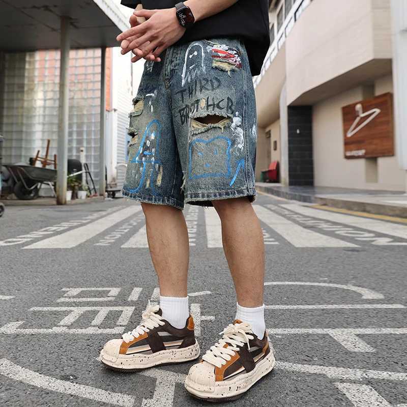 Summer US high-end trend graffiti printed hole jeans loose and fully matched mens pants W250319