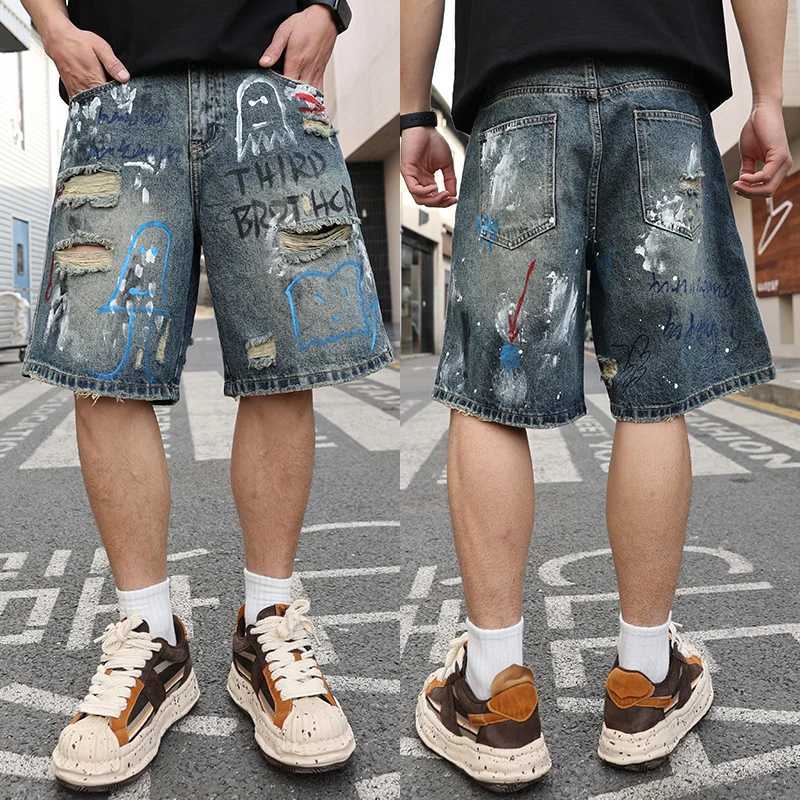 Summer US high-end trend graffiti printed hole jeans loose and fully matched mens pants W250319