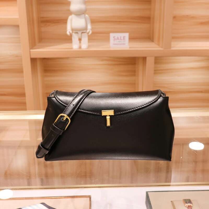 2025 new women's niche simple top layer cowhide T-shaped lock fashion commuter crossbody large capacity shoulder bag