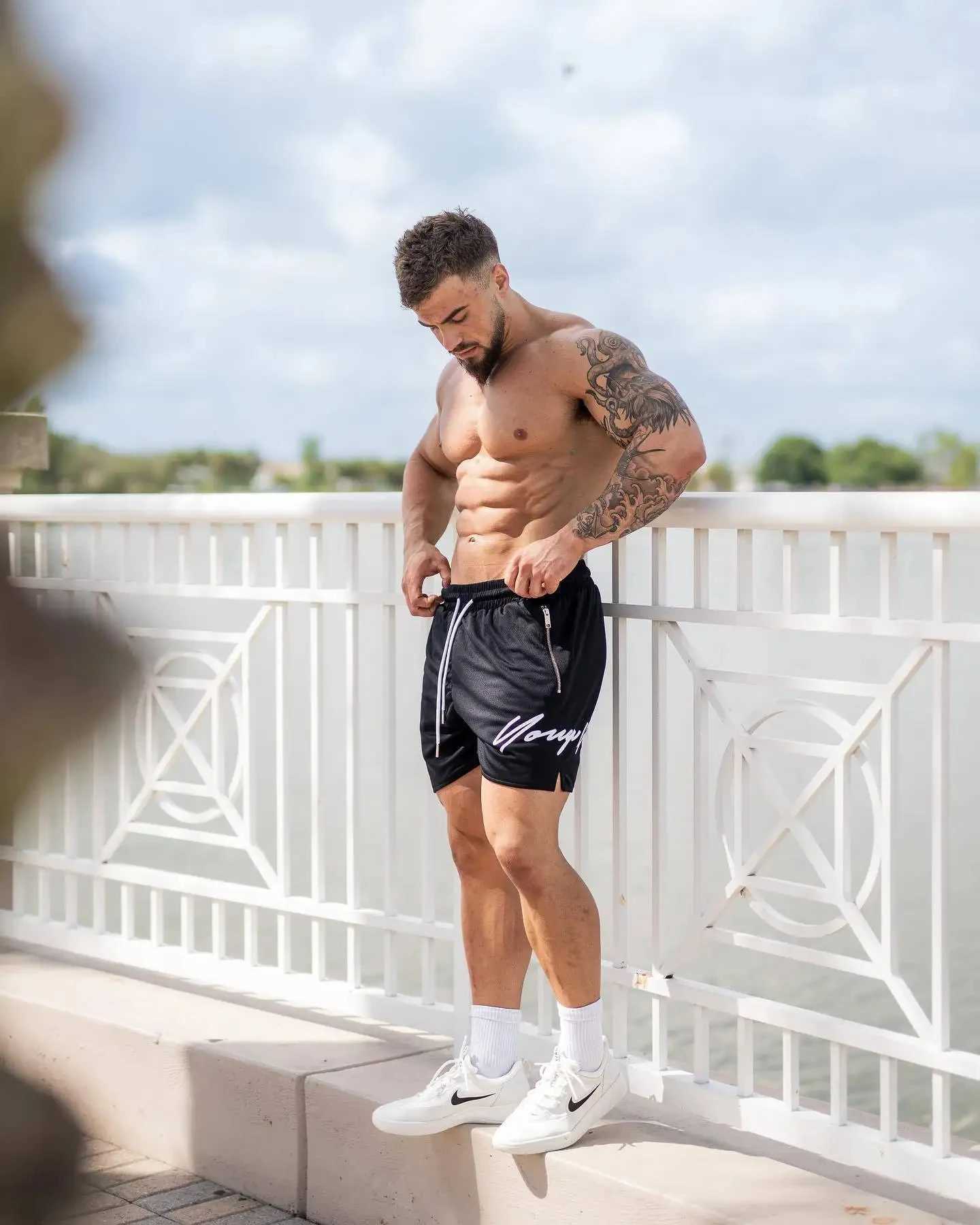 Mesh summer mens ice silk thin loose basketball zipper pocket for quick drying and breathable quarter pants W250319