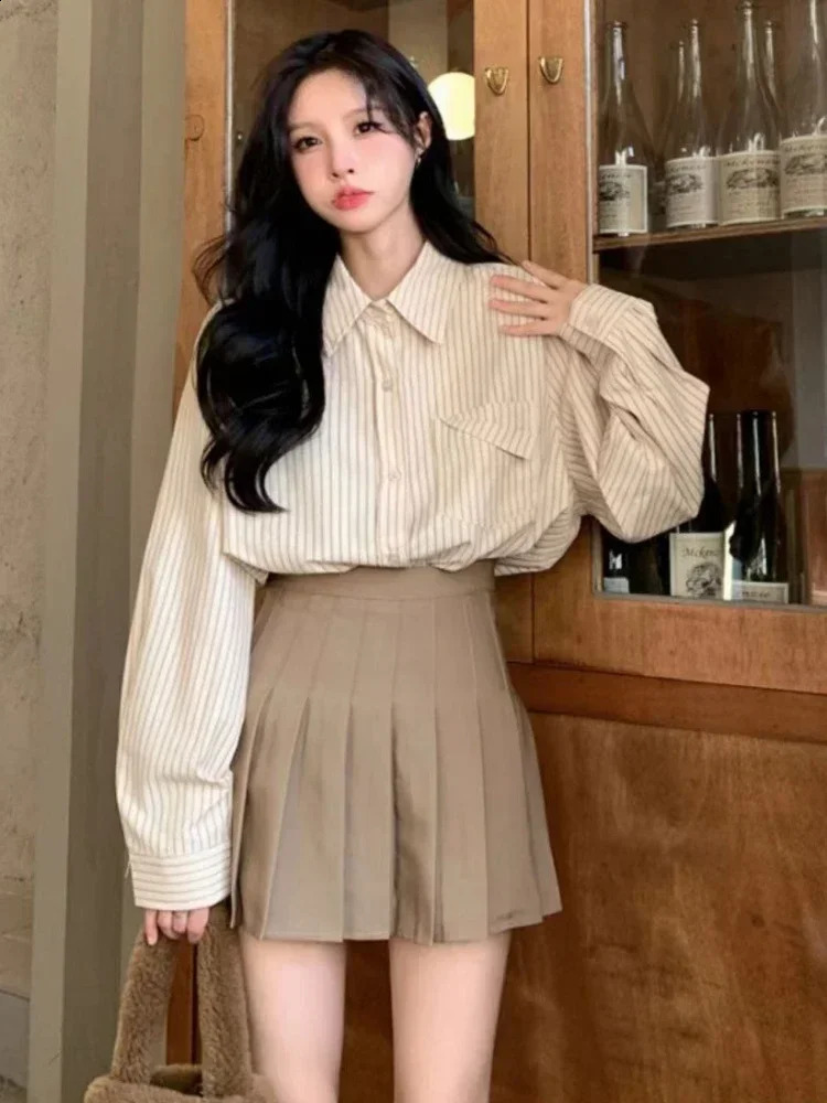 Korean fashion womens loose long sleeved shirt with pockets for casual spring blue striped 250318