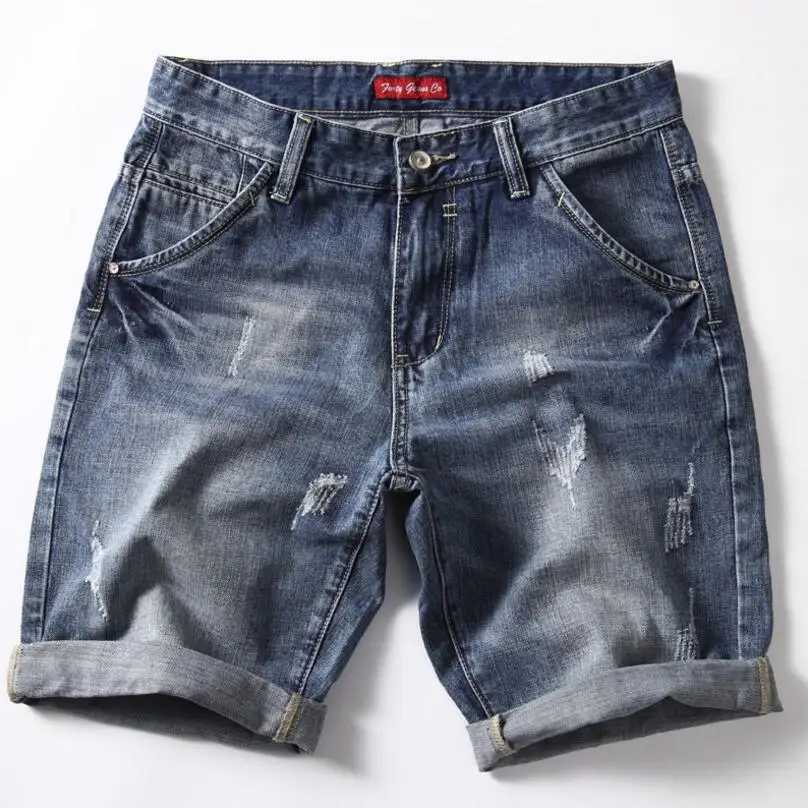 Mens blue stretch denim shorts paired with high-quality stretch casual denim jeans new summer shorts size 42 W250319