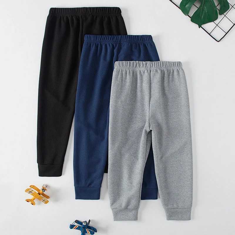 1/3 childrens waffles solid color sports pants boys casual clown harem pants elastic waist running pants girls fashionable pantsT250318