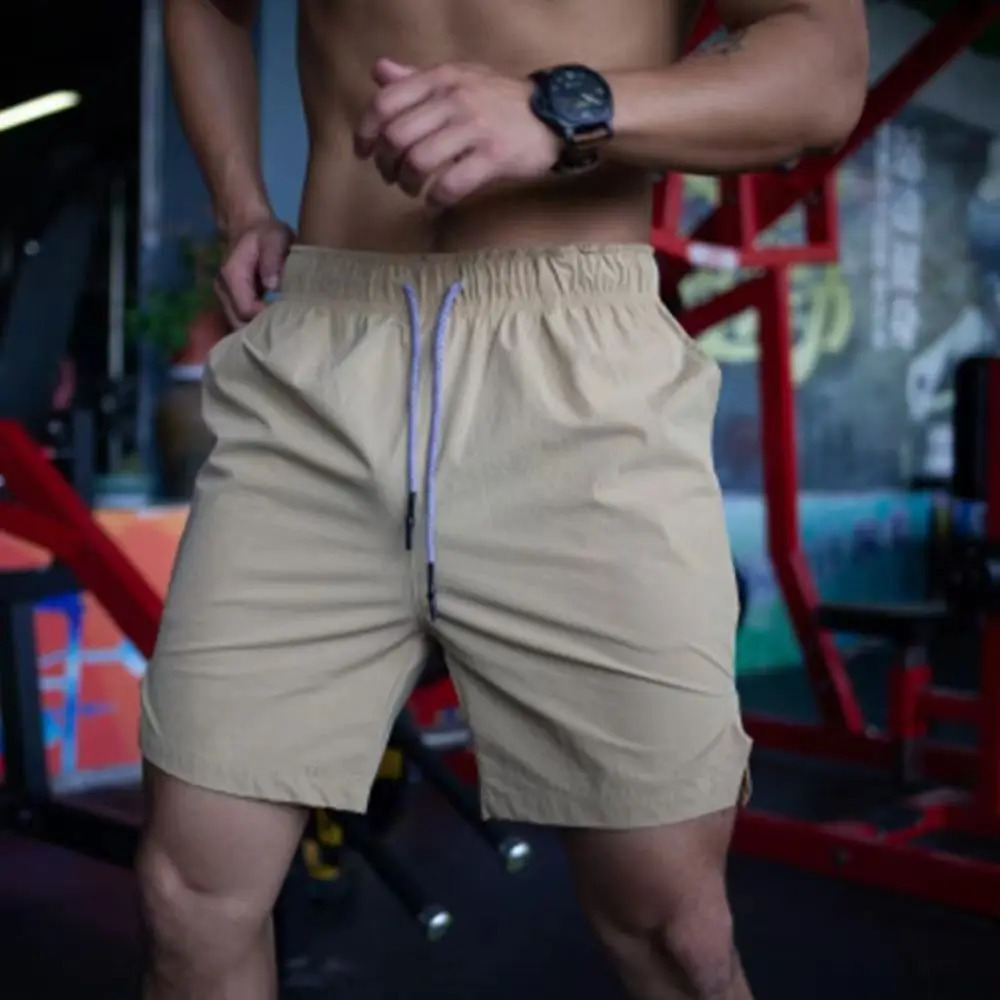 2024 Mens Gym Fitness Loose Sports Pants Summer Quick Dry Leisure Beach Brand 250312