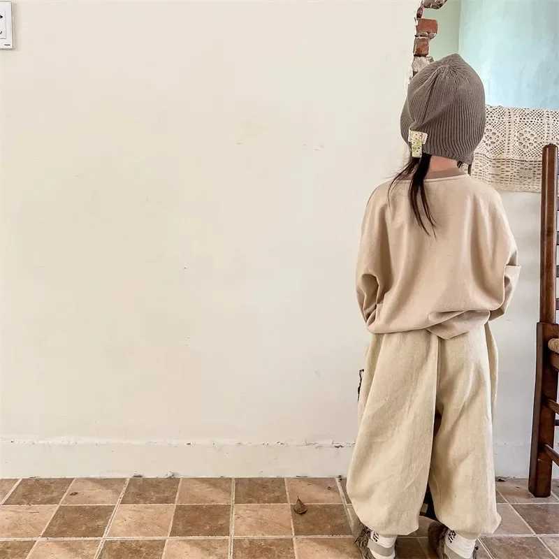 Baby retro pocket harem pants loose girls casual pants solid color boys childrens fashion pants childrens apronT250318