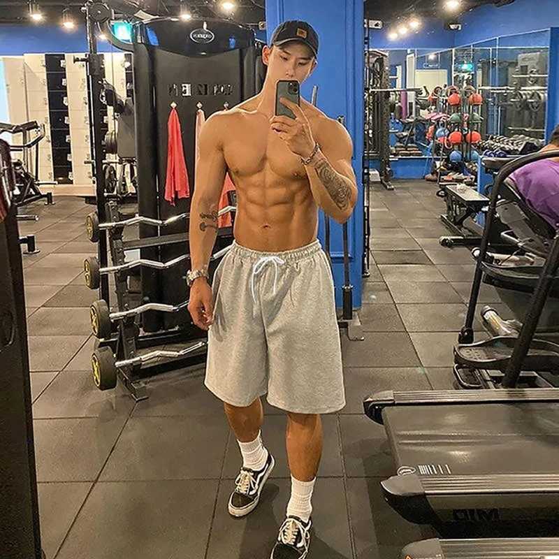 Summer gym fitness mens cotton shorts with shredded fabric cutting shorts for casual training hip-hop running loose basketball shorts W250319