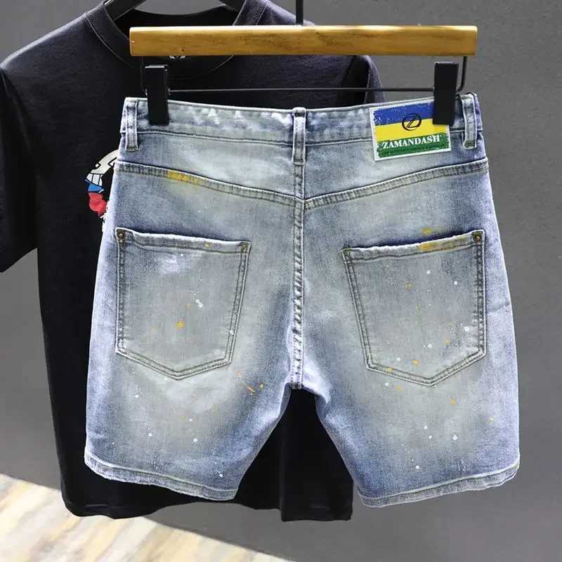 Summer loose thin paint splash denim shorts for men mid to long riding breeze elastic pants W250319