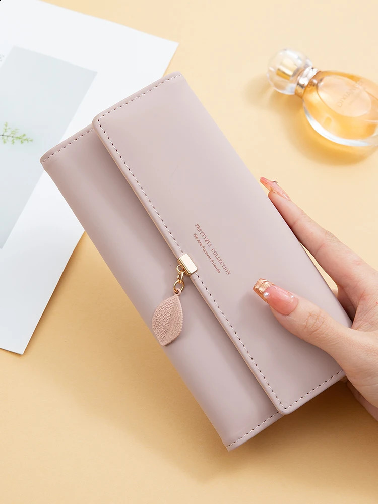 selling spring and summer womens PU leather Japanese and Korean small leaf pendant three fold bag large capacity 250318