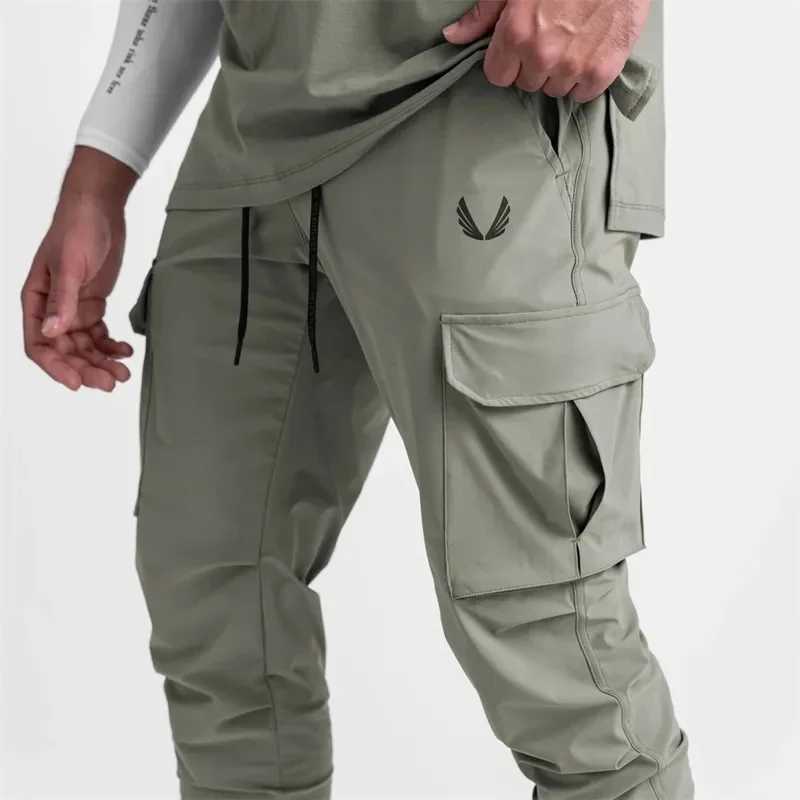 2023 New Mens Cargo Pants Summer Thin Loose Quick-Drying Elastic Leggings Running Training Sweatpants Casual Trend Trousers X250319
