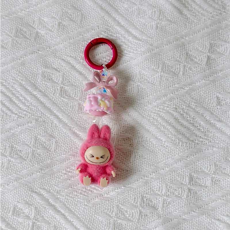 New Mini Labubu Kawaii Particle Bow Keychain Creative 3D Doll Bag Phone Charm Keychain Male and Female Gifts X250318