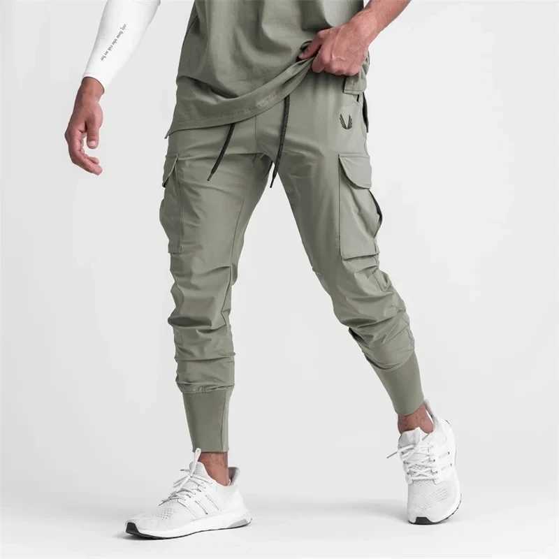 2024 New Mens Cargo Pants Summer Thin Loose Quick-Drying Elastic Leggings Running Training Sweatpants Casual Trend Trousers X250319