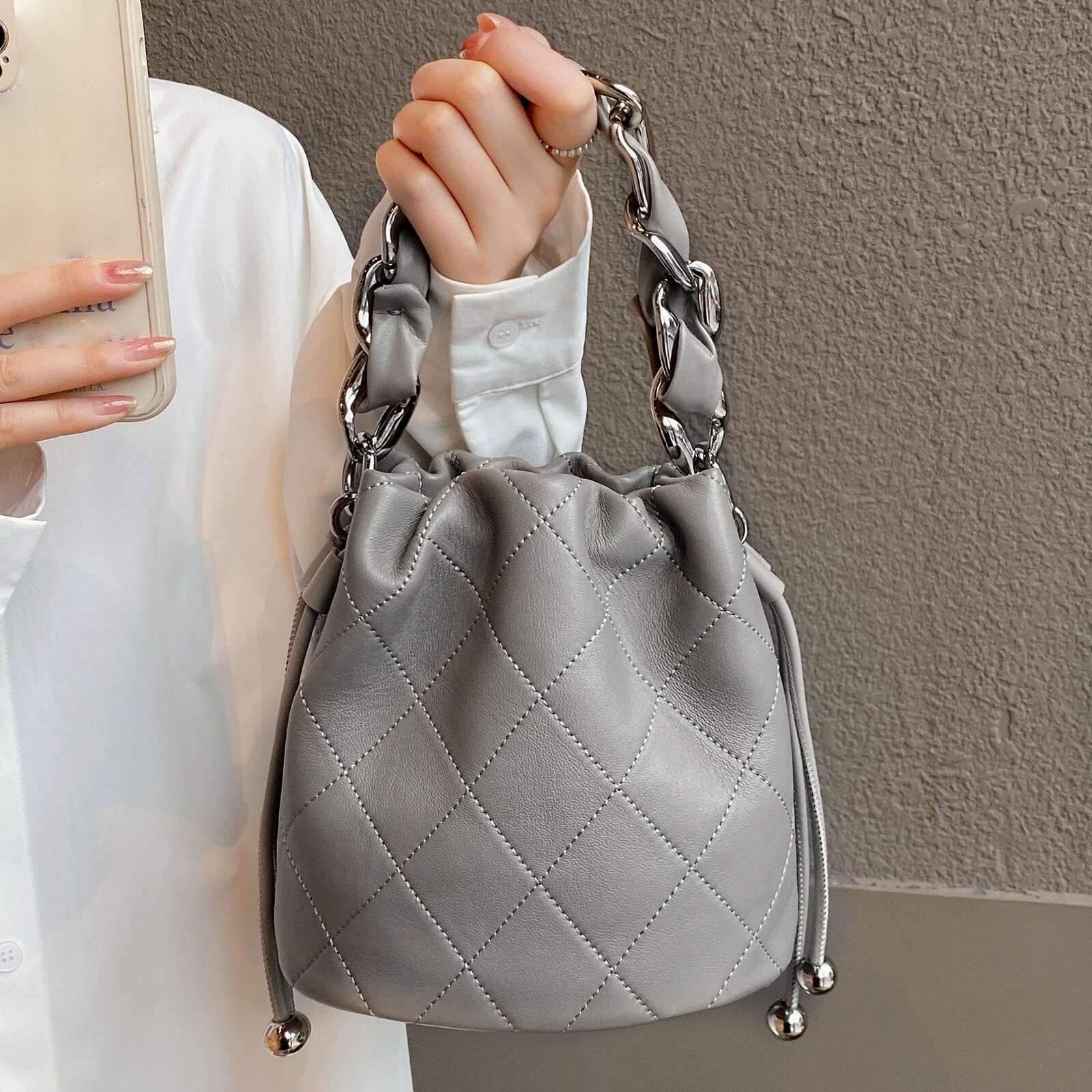 Genuine Leather Quilted Drawstring Bucket Bag Women With Chain Strap Crossbody Handbag For Daily Use And Commuting