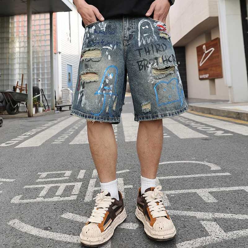Summer US high-end trend graffiti printed hole jeans loose and fully matched mens pants W250319