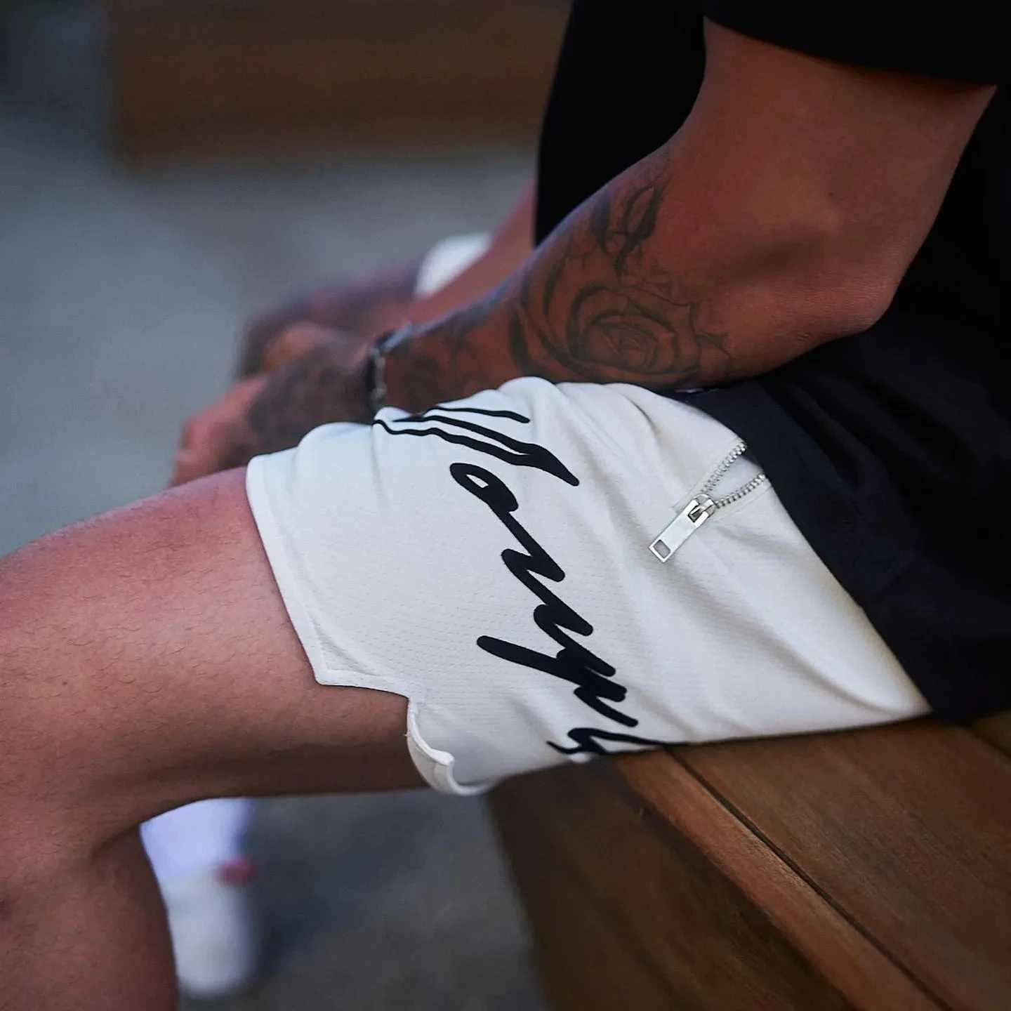 Mesh summer mens ice silk thin loose basketball zipper pocket for quick drying and breathable quarter pants W250319