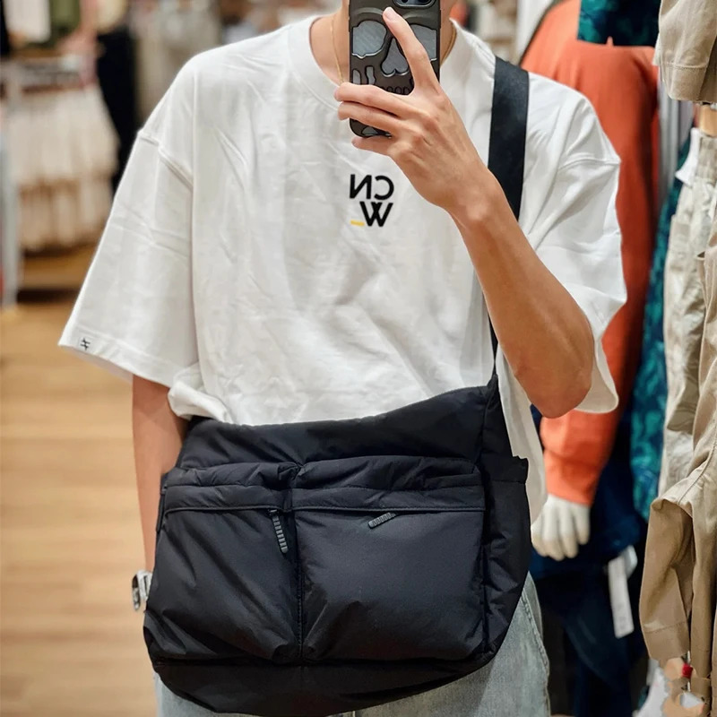 Large capacity casual shoulder bag with single shoulder strap and multiple pockets suitable for outdoor travel and business use 250318